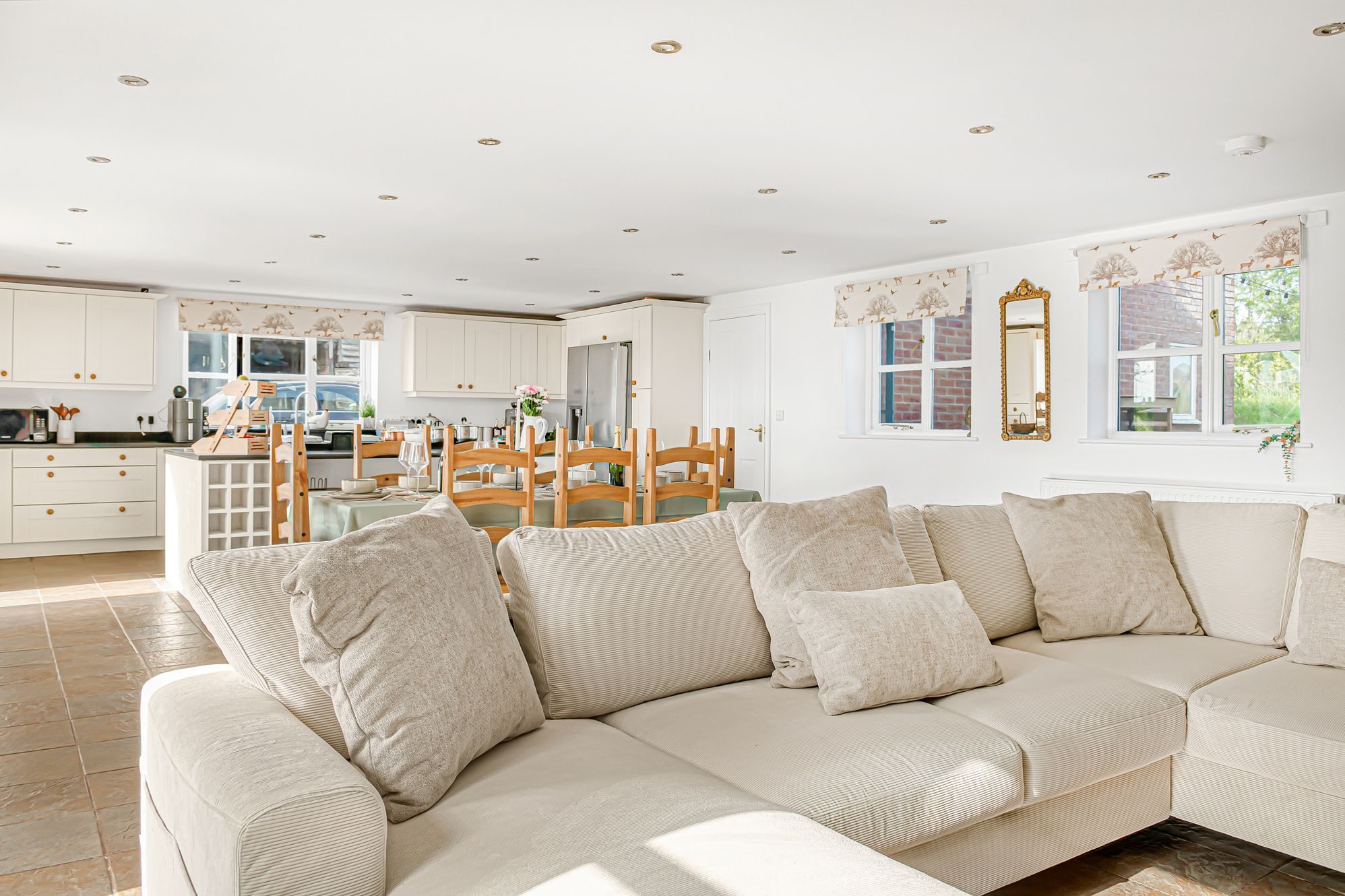 The open-plan kitchen, dining room and sitting room